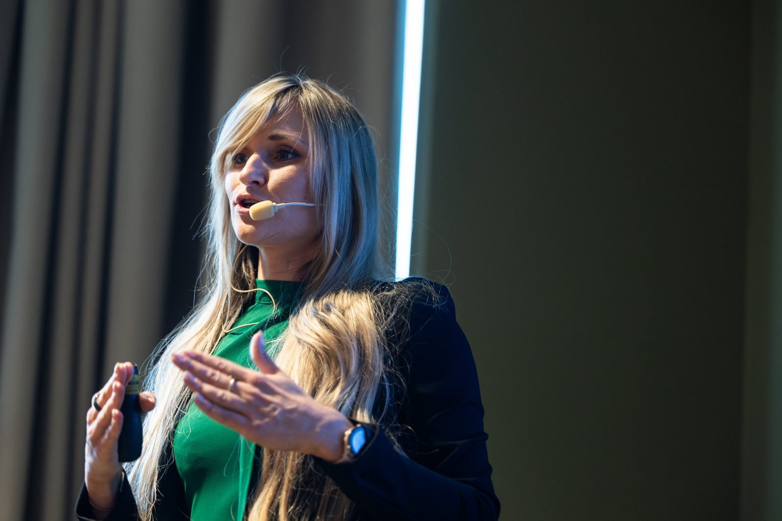 Odeta Isevičiūtė speaking at Vilnius AI Summit 2026.